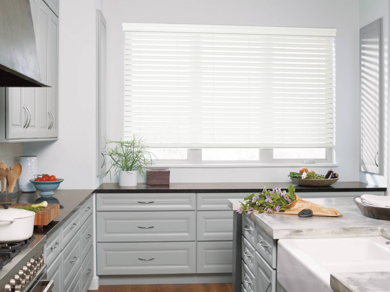 Hunter Douglas Everwood® Faux Wood Blinds in a modern kitchen near Brunswick, GA