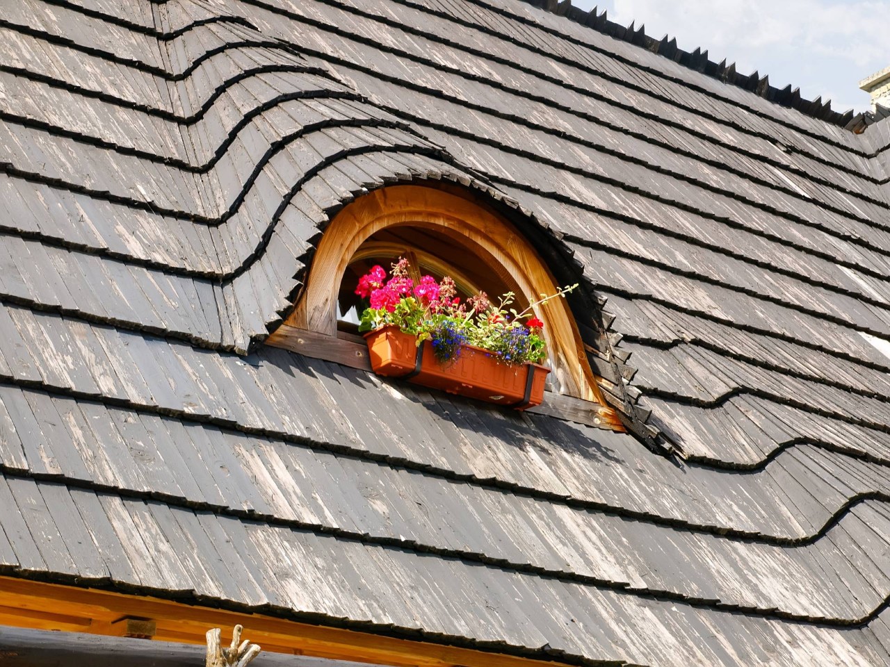 Eyebrow window on the roof of a house near Brunswick, GA